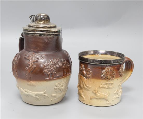 A Stoneware silver mounted jug and a matching mug, height 21cm